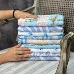 شال طرحدار گل ریز بابونه پلیسه تابستانه نخی فران لند نخ چهار فصل عمده آبی آسمانی