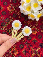 گیره تق تقی آفتابگردون اکسسوری رشت فرانلند