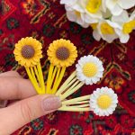 گیره تق تقی آفتابگردون اکسسوری رشت فرانلند
