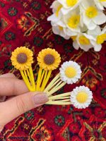 گیره تق تقی آفتابگردون اکسسوری رشت فرانلند