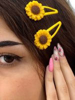 گیره تق تقی آفتابگردون اکسسوری رشت فرانلند